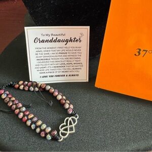 Beautiful Granddaughter Multicolor Beaded Infinity Bracelet with black by 37 Inc
